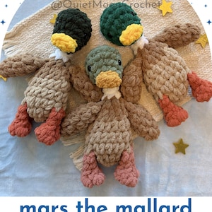 May include: Three handmade crochet mallard duck toys. The ducks have brown bodies, orange feet, and green, black, and olive green heads with yellow beaks. The text "mars the mallard" and "finished lovey" is visible.