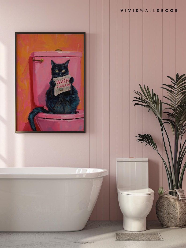 May include: A black cat sitting on a pink toilet with a newspaper that reads "Wash Your Paw" in a bathroom setting with a white bathtub and a white toilet.