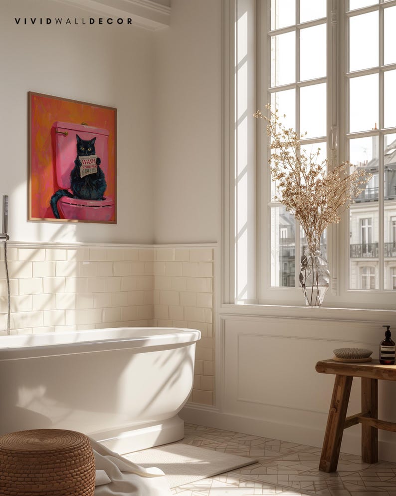May include: A black cat sitting on a pink toilet with a sign that says "Wash Your Paws" in a bathroom with white tile and a window with a view of a city.