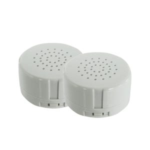 May include: Two circular white plastic sound modules with a flat top surface featuring a perforated grid of small holes arranged in concentric circles. The sides of the modules are smooth with vertical indentations along the lower edge.