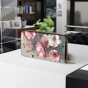 Florale Reißverschlusstasche mit rosa Blumen - elegantes und stilvolles Accessoire