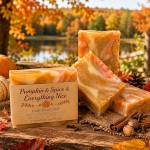 May include: Three rectangular bars of handmade soap with a marbled orange, white, and pink pattern. A brown paper label on the front reads: Pumpkin & Spice & Everything Nice, Handmade Soap, With Real Pumpkin & Warm Spices, 4.5-5.5 oz, 2x3 to 2x3.5.