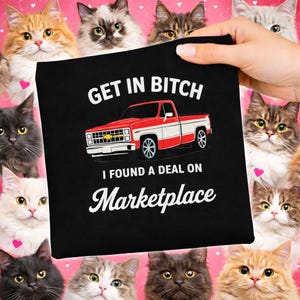 May include: Black t-shirt with a red and white pickup truck graphic and the text "GET IN BITCH" and "I FOUND A DEAL ON Marketplace". The background features various cat faces on a pink background.