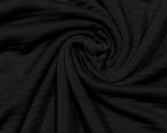 Power Grid Fleece by Polartec.  Performance Knit Fabric in Black *2nds*