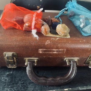 Polished rock bags; decorative tumbled stones.