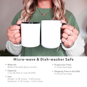 May include: Two white ceramic mugs with black handles and black interiors are held up. The mugs are labeled as microwave and dishwasher safe. The height is between 3.78 and 4.69 inches, and the diameter is between 3.19 and 3.43 inches.