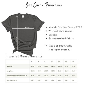May include: A dark gray t-shirt with a size chart and product information. The shirt is a Comfort Colors 1717 model, unisex, without side seams, and made of garment-dyed fabric. Measurements are provided in inches for width, length, and sleeve length.