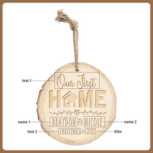 May include: A wooden Christmas ornament with the text "Our First Home" and the names "Braydon & Nicole" engraved on it. The ornament is round, made of a wood slice, and includes the year "2017". It has a natural wood grain and a jute twine hanger.