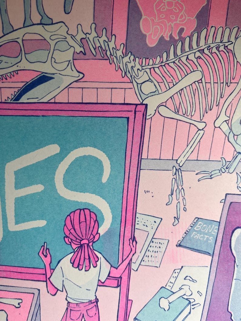 May include: A pink and blue illustration of a classroom with a skeleton of a dinosaur hanging from the ceiling. A person with pink hair is writing the word "YES" on a chalkboard. A book titled "BONE FACTS" is on a table.