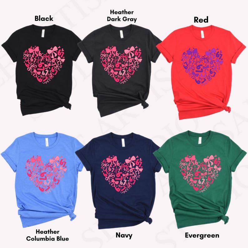 May include: A collection of six short-sleeved t-shirts in various colors: black, dark gray, red, heather blue, navy, and evergreen. Each shirt features a heart-shaped design composed of bows and the number "67" in pink or purple.