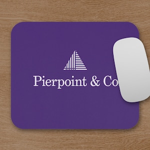 May include: A purple rectangular mousepad with rounded corners. The mousepad features the white text "Pierpoint & Co" below a white triangle logo. A white computer mouse is positioned on the right side of the mousepad.
