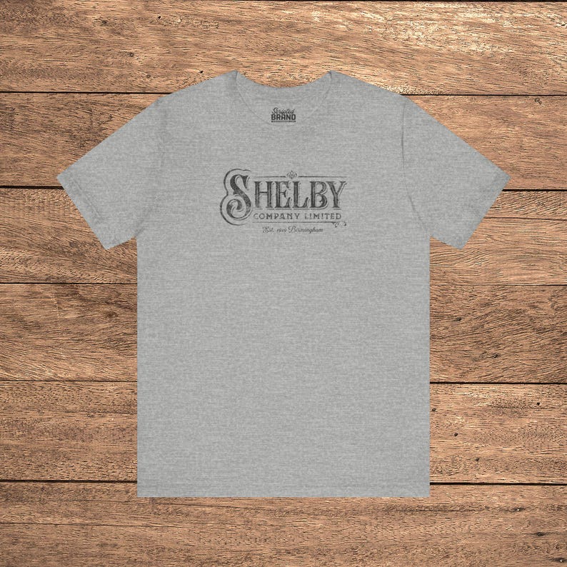 Heather Gray Bella+Canvas 3001 t-shirt featuring a vintage Shelby Company Limited logo from Peaky Blinders.