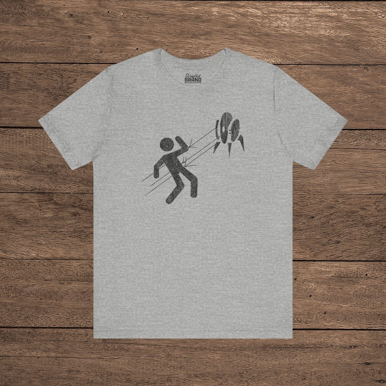 Heather Gray Aperture Science Turret warning icon t-shirt on Bella+Canvas 3001, vintage distressed print, Portal and Portal 2 fan tee.