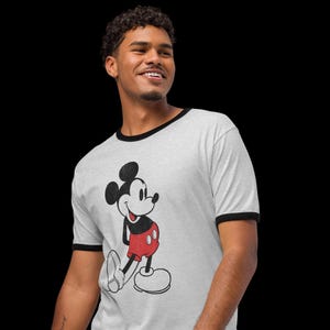 Man wearing The Outsiders Two-Bit Mathews Vintage Mickey T-shirt - Unisex Cotton Ringer Tee