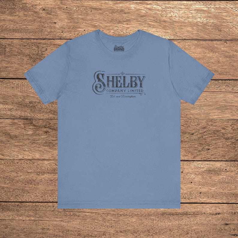 Steel Blue Bella+Canvas 3001 t-shirt featuring a vintage Shelby Company Limited logo from Peaky Blinders.