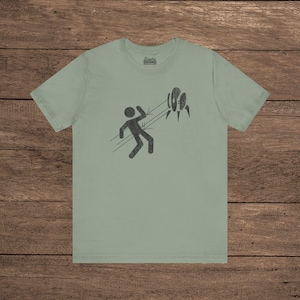 Sage green Aperture Science Turret warning icon t-shirt on Bella+Canvas 3001, vintage distressed print, Portal and Portal 2 fan tee.