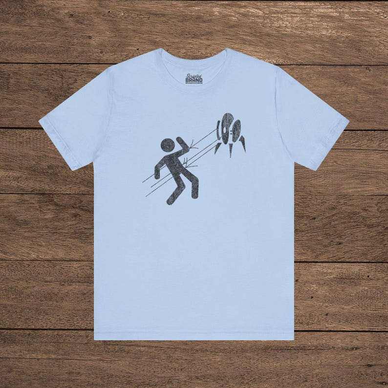 Light Blue Aperture Science Turret warning icon t-shirt on Bella+Canvas 3001, vintage distressed print, Portal and Portal 2 fan tee.