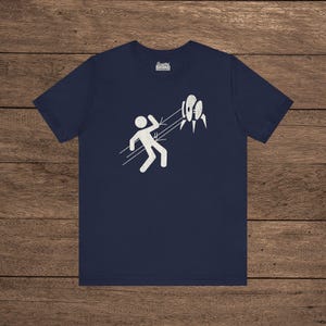 Navy Blue Aperture Science Turret warning icon t-shirt on Bella+Canvas 3001, vintage distressed print, Portal and Portal 2 fan tee.