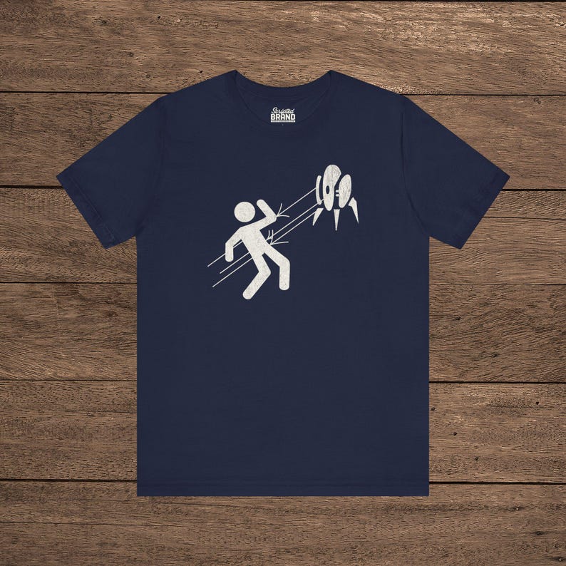 Navy Blue Aperture Science Turret warning icon t-shirt on Bella+Canvas 3001, vintage distressed print, Portal and Portal 2 fan tee.