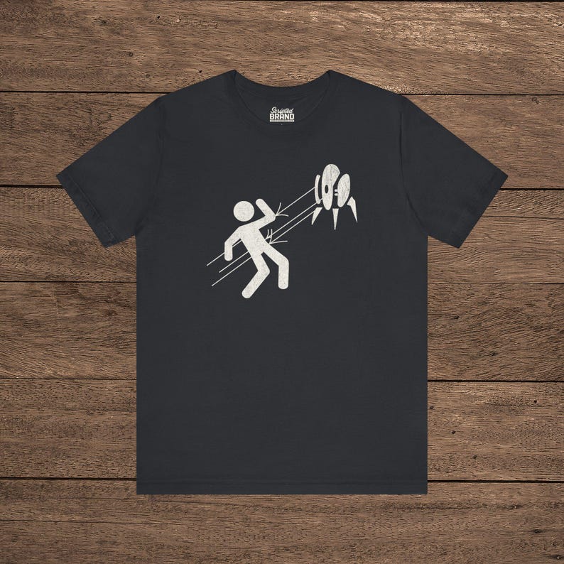 Black Aperture Science Turret warning icon t-shirt on Bella+Canvas 3001, vintage distressed print, Portal and Portal 2 fan tee.