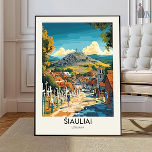 May include: A framed art print of Šiauliai, Lithuania, featuring a colorful illustration of a townscape with a hill covered in crosses. The artwork has a vibrant palette of blues, greens, and oranges, with the town's name and country at the bottom.