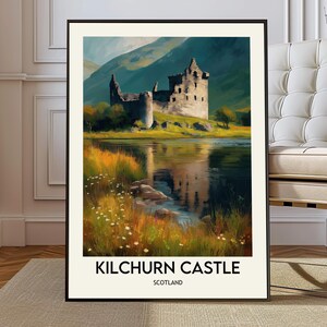 May include: A framed art print featuring Kilchurn Castle in Scotland. The artwork depicts the castle on a lake with mountains in the background. The color palette includes greens, blues, and browns. The text "KILCHURN CASTLE SCOTLAND" is at the bottom.