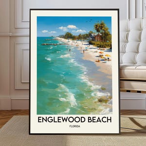 Puede incluir: Una impresión artística enmarcada de Englewood Beach, Florida. La obra de arte representa una vibrante escena de playa con agua turquesa, una orilla arenosa y gente disfrutando del día. El cielo es azul con nubes esponjosas. El texto "ENGLEWOOD BEACH FLORIDA" está en la parte inferior.