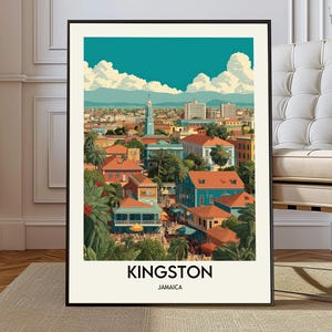 May include: A framed art print featuring a stylized illustration of Kingston, Jamaica. The artwork depicts a cityscape with colorful buildings, lush greenery, and a bright blue sky with fluffy clouds. The word "KINGSTON" is printed at the bottom.