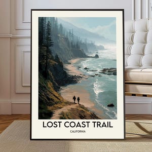 May include: A framed art print featuring a coastal landscape with a trail. The artwork depicts a beach, ocean, and cliffs with trees. The text "LOST COAST TRAIL CALIFORNIA" is at the bottom.