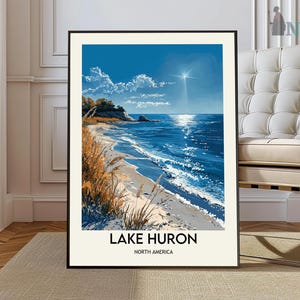 Puede incluir: Un póster de estilo vintage con una ilustración azul y blanca del lago Hurón, América del Norte. El póster tiene un marco negro y el texto "Lake Huron, North America" está impreso en la parte inferior.