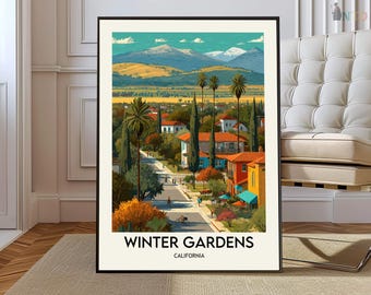 May include: A framed art print featuring a landscape illustration of Winter Gardens, California. The scene depicts a street lined with palm trees, colorful buildings with orange roofs, and distant snow-capped mountains under a blue sky.
