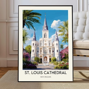 Puede incluir: Impresión artística enmarcada de la Catedral de San Luis en Nueva Orleans. La obra representa la catedral blanca con altas agujas, rodeada de palmeras y flores coloridas bajo un cielo azul brillante. El texto en la parte inferior dice "ST. LOUIS CATHEDRAL NEW ORLEANS."
