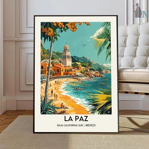 May include: A vintage travel poster featuring a colorful illustration of La Paz, Baja California Sur, Mexico. The poster depicts a beach scene with palm trees, a church, and people enjoying the sun and sand. The text "LA PAZ" is prominently displayed at the bottom of the poster, along with the location information.