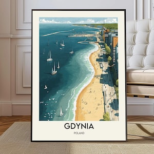 May include: A framed art print of Gdynia, Poland, featuring a coastal scene. The artwork depicts a sandy beach, sailboats on turquoise water, and a city skyline. The print has a black frame and the text "GDYNIA POLAND" at the bottom.