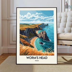 May include: A colorful illustration of Worm's Head, a dramatic cliff face on the coast of Wales. The image shows a rocky headland with a sandy beach and turquoise water. The text "Worm's Head, Wales" is at the bottom of the image.
