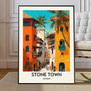 May include: A framed art print of Stone Town, Zanzibar. The artwork depicts a vibrant street scene with colourful buildings in shades of orange and yellow, with blue accents. Palm trees and a bright blue sky complete the tropical scene. The text "STONE TOWN ZANZIBAR" is at the bottom.