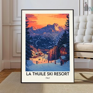 May include: A vintage-style poster featuring a colorful illustration of a ski resort in the Italian Alps. The poster has the text "La Thuile Ski Resort, Italy" at the bottom.