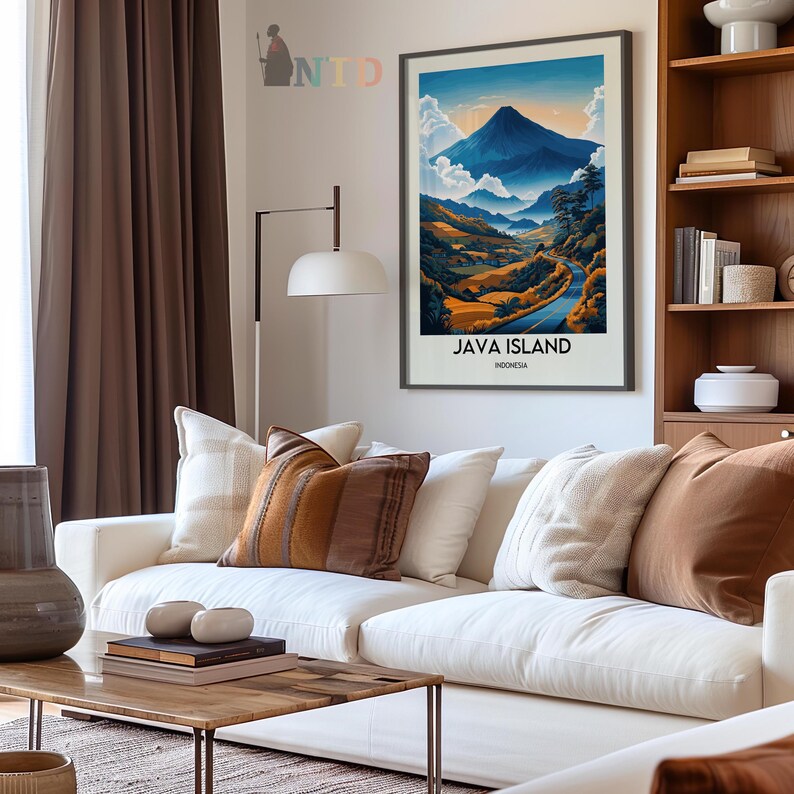 May include: A vintage travel poster featuring a scenic view of a mountain range with a winding road leading through the landscape. The poster is titled "Java Island, Indonesia".