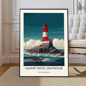 Pode incluir: Uma impressão artística emoldurada do Farol de Gannet Rock em New Brunswick. O farol, vermelho e branco, está situado numa ilha rochosa com água e céu azuis. A impressão tem uma moldura preta e o texto "Gannet Rock Lighthouse" e "New Brunswick".