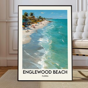 Puede incluir: Una impresión artística enmarcada de Englewood Beach, Florida. La obra de arte representa una vibrante escena de playa con agua turquesa, una playa de arena y palmeras. El texto "ENGLEWOOD BEACH FLORIDA" está impreso en la parte inferior.