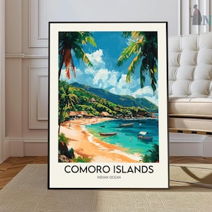 May include: A framed art print of the Comoro Islands, featuring a vibrant beach scene. The artwork depicts a sandy beach, turquoise water, boats, and lush green mountains under a bright blue sky with palm trees. The text "COMORO ISLANDS INDIAN OCEAN" is at the bottom.