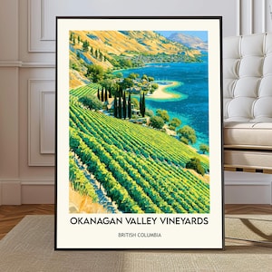 May include: A framed print of the Okanagan Valley Vineyards in British Columbia. The artwork depicts a vibrant landscape with green vineyards, a blue lake, and golden hills under a bright sky. Text at the bottom reads "Okanagan Valley Vineyards, British Columbia."