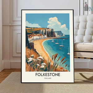 May include: A vintage travel poster featuring a colourful illustration of Folkestone, England. The poster depicts a seaside town with white buildings, a sandy beach, and blue water. The text "Folkestone, England" is printed at the bottom of the poster.