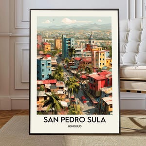 May include: A framed art print of San Pedro Sula, Honduras. The artwork depicts a colorful cityscape with buildings in shades of blue, red, yellow, and orange. Palm trees line the streets, and the sky is a light blue. The text "SAN PEDRO SULA" and "HONDURAS" are at the bottom.