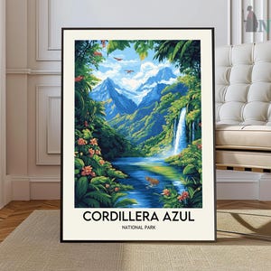 May include: A framed art print of Cordillera Azul National Park. The artwork shows a vibrant landscape with a waterfall, a blue lake, and lush green vegetation. The sky is blue with white clouds and birds. The text "CORDILLERA AZUL NATIONAL PARK" is at the bottom.