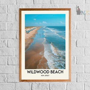 May include: A framed print depicting Wildwood Beach, New Jersey. The image shows a sandy beach with ocean waves under a bright blue sky. The text "Wildwood Beach, New Jersey" is printed at the bottom of the image.