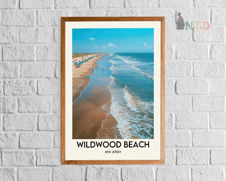 May include: A framed print depicting Wildwood Beach, New Jersey. The image shows a sandy beach with ocean waves under a bright blue sky. The text "Wildwood Beach, New Jersey" is printed at the bottom of the image.