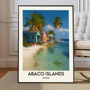 May include: A framed print featuring a coastal scene of the Abaco Islands, Bahamas. The image shows vibrant buildings, palm trees, and clear water under a blue sky. The text "ABACO ISLANDS BAHAMAS" is displayed at the bottom of the print.