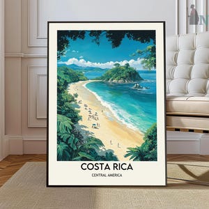 May include: A framed poster featuring a colourful illustration of a tropical beach in Costa Rica. The poster depicts a lush green jungle, a sandy beach, and turquoise blue water. The text "Costa Rica" and "Central America" is printed at the bottom of the poster.