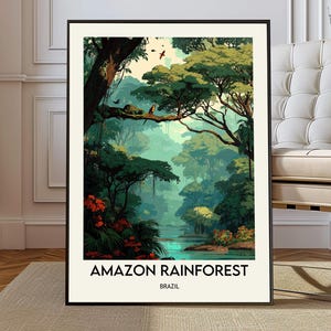 May include: A framed art print of the Amazon Rainforest. The artwork depicts a lush, green rainforest scene with a river, trees, and birds. The text "AMAZON RAINFOREST BRAZIL" is at the bottom of the print.